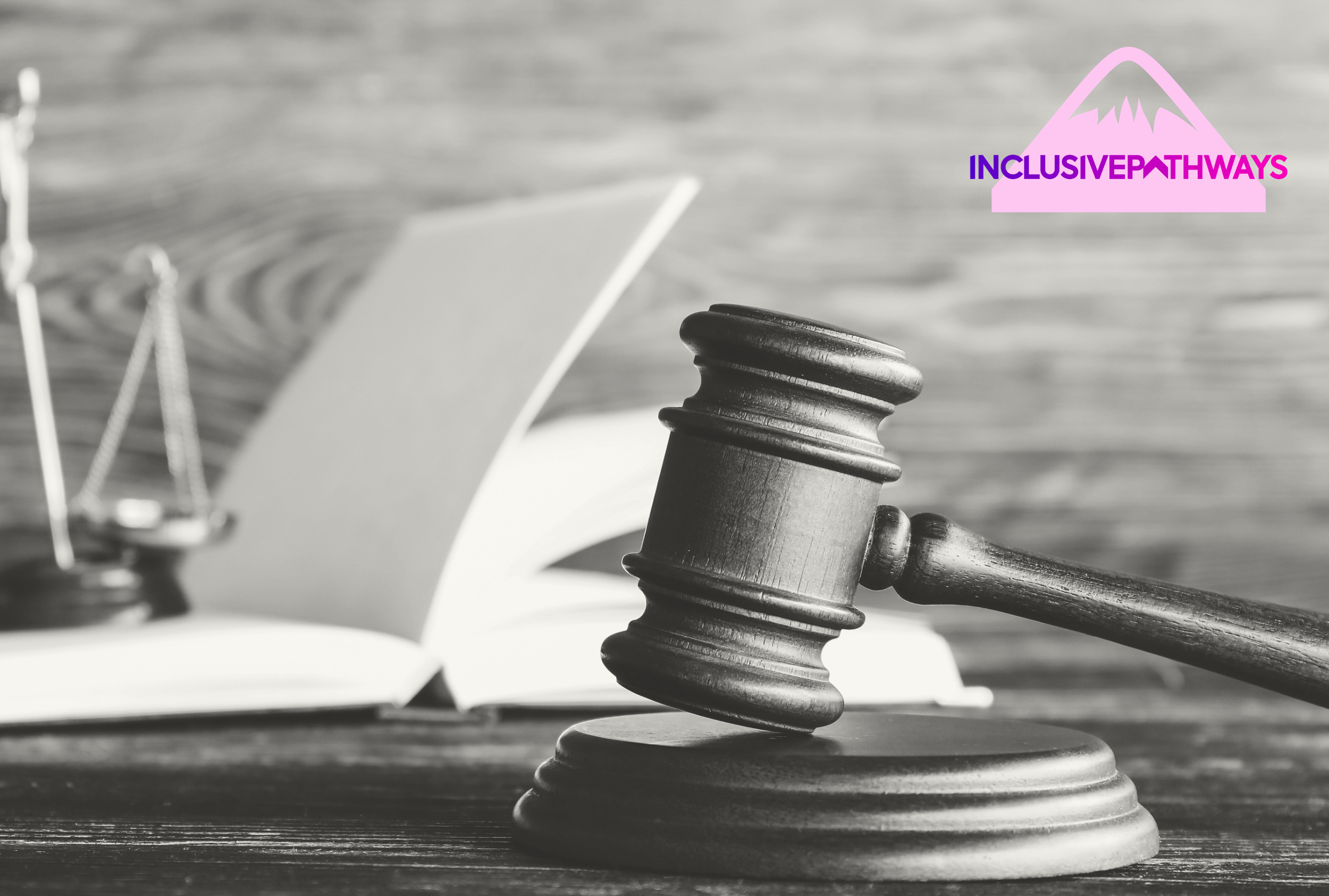 A gavel on a sound block with an open book behind and a logo in the corner reading "INCLUSIVEPATHWAYS".