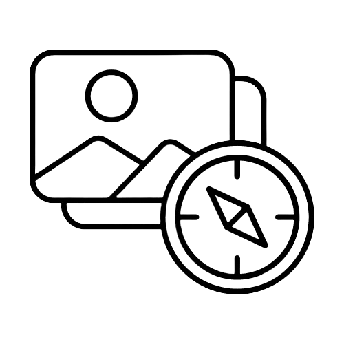 A compass in front of several photographs