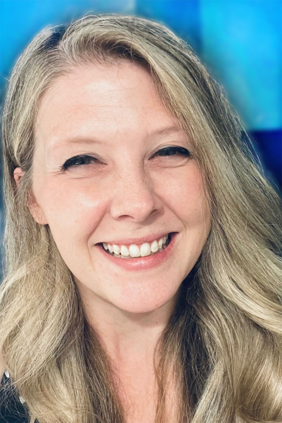 A portrait of Jessica Winchester smiling